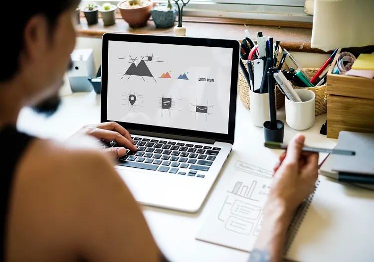 a person creating logo