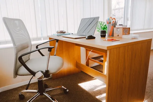 empty office chair at desk