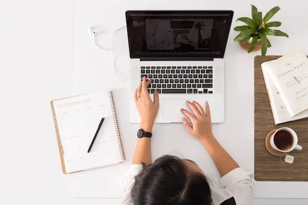 woman working on her laptop