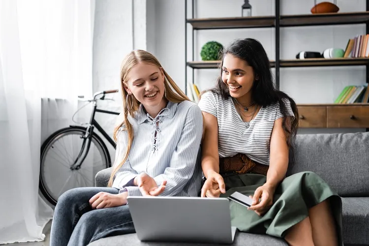 two friends working remotely
